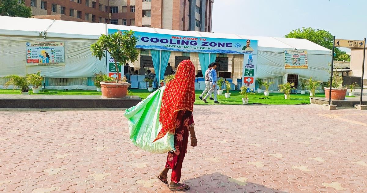 For workers in Delhi’s deadly heat, cooling zones can only offer a temporary respite